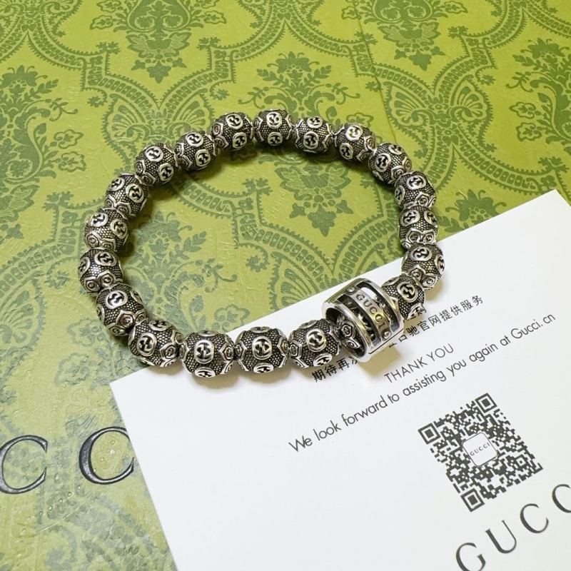 G*u*i bracelets